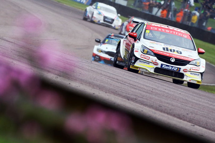 Sterling Insurance with Power Maxed Racing Vauxhall Astras battle at the sharp end at the high speed Thruxton circuit.
